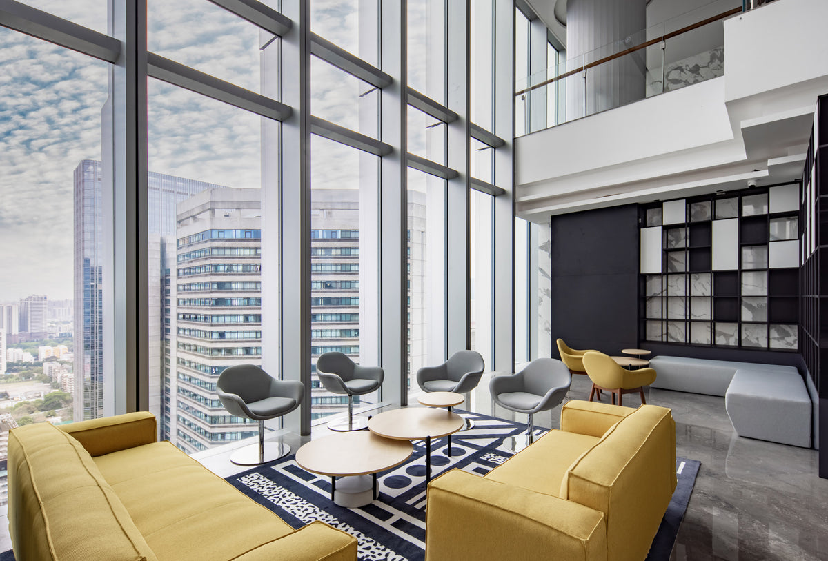 Bowler designer lounge chair by Matsu, designed by Joeri Reynaert, featuring a soft curved upholstered seat with premium Gabriel fabric