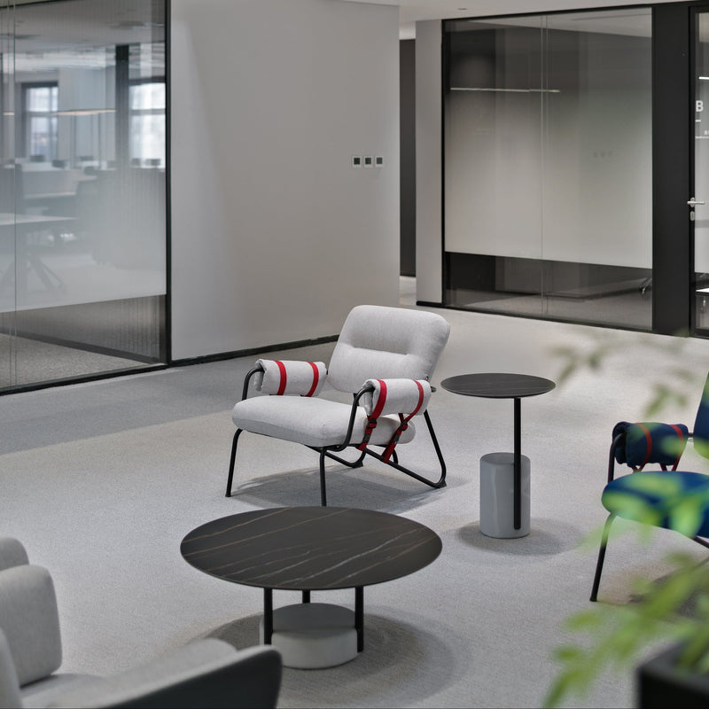 Modern lounge and armchairs in a stylish living room setting