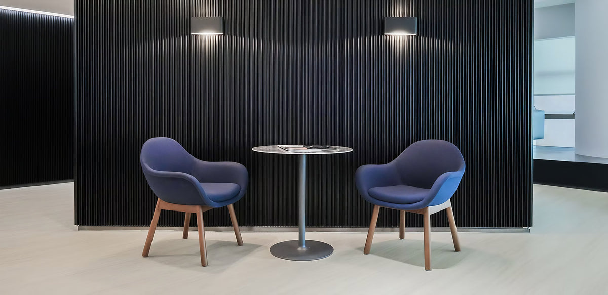 Bowler designer lounge chair by Matsu, designed by Joeri Reynaert, featuring a soft curved upholstered seat with premium Gabriel fabric
