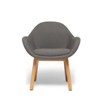 Bowler designer lounge chair by Matsu, designed by Joeri Reynaert, featuring a soft curved upholstered seat with premium Gabriel fabric