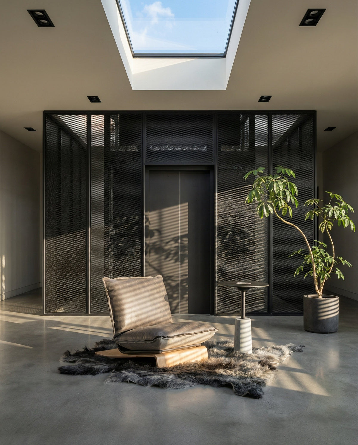 NOMAD Skin Lounge Chair with yak fur rug under a skylight
